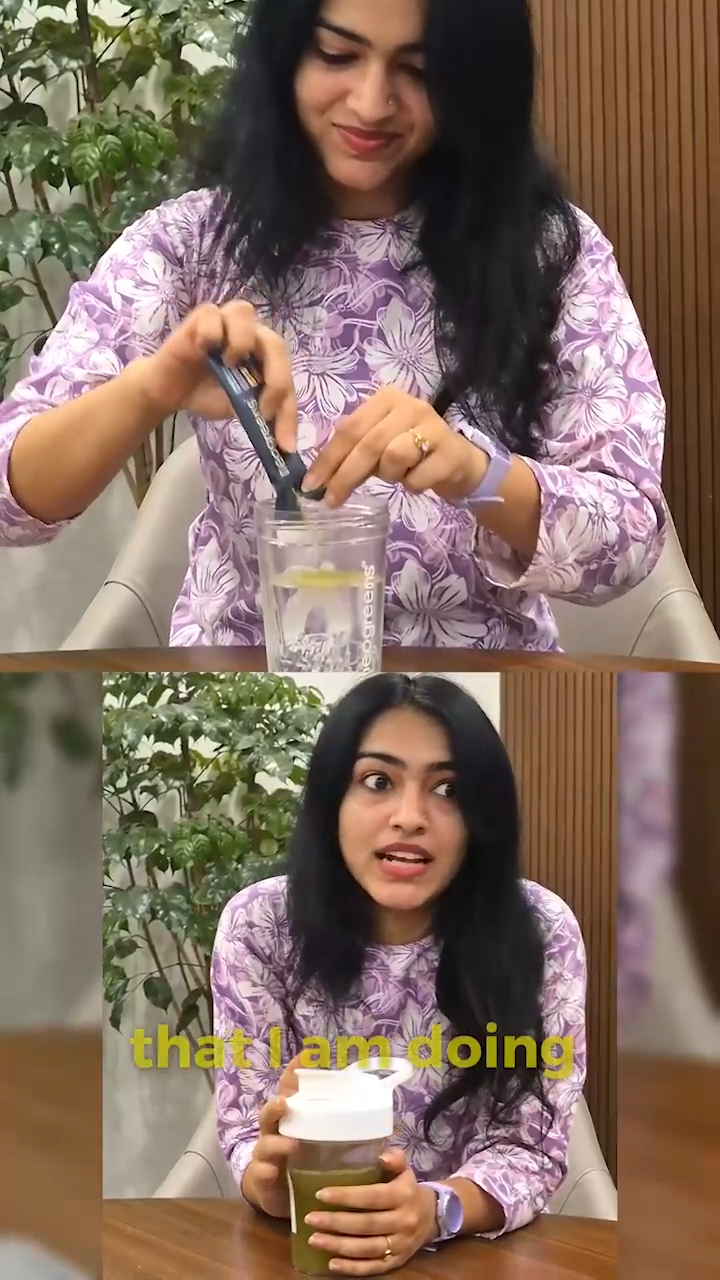 Woman pouring a NeoGreens Daily Greens stick pack into a shaker